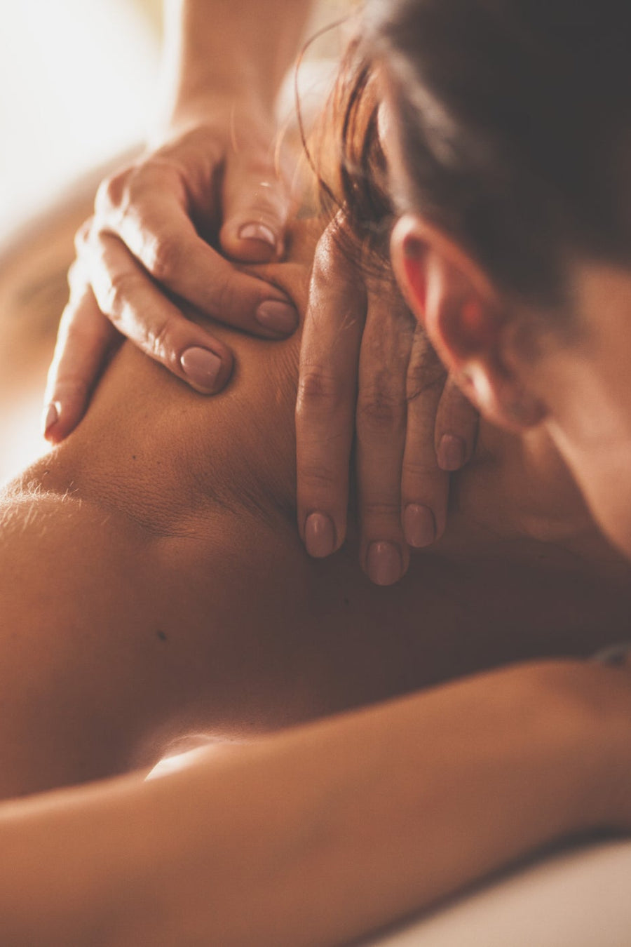 A guest relaxing during a massage
