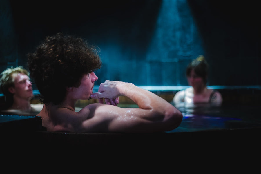 Guests relaxing in the cedar hot tub at The Dragontree Sanctuary