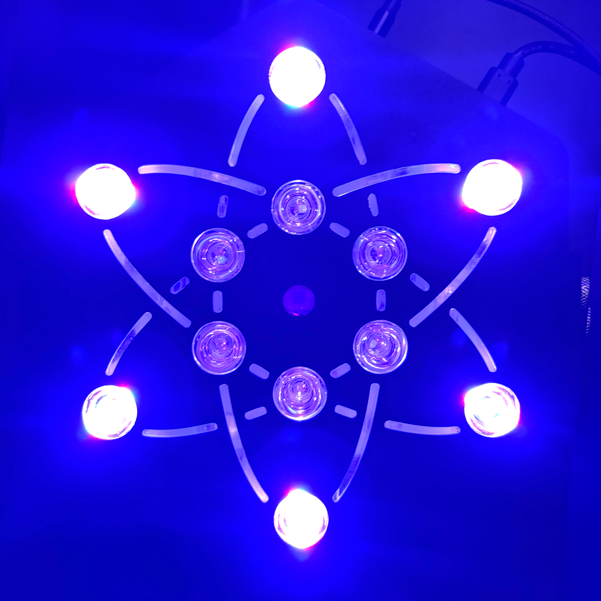 The Atom Light sound-reactive light used during sound healing