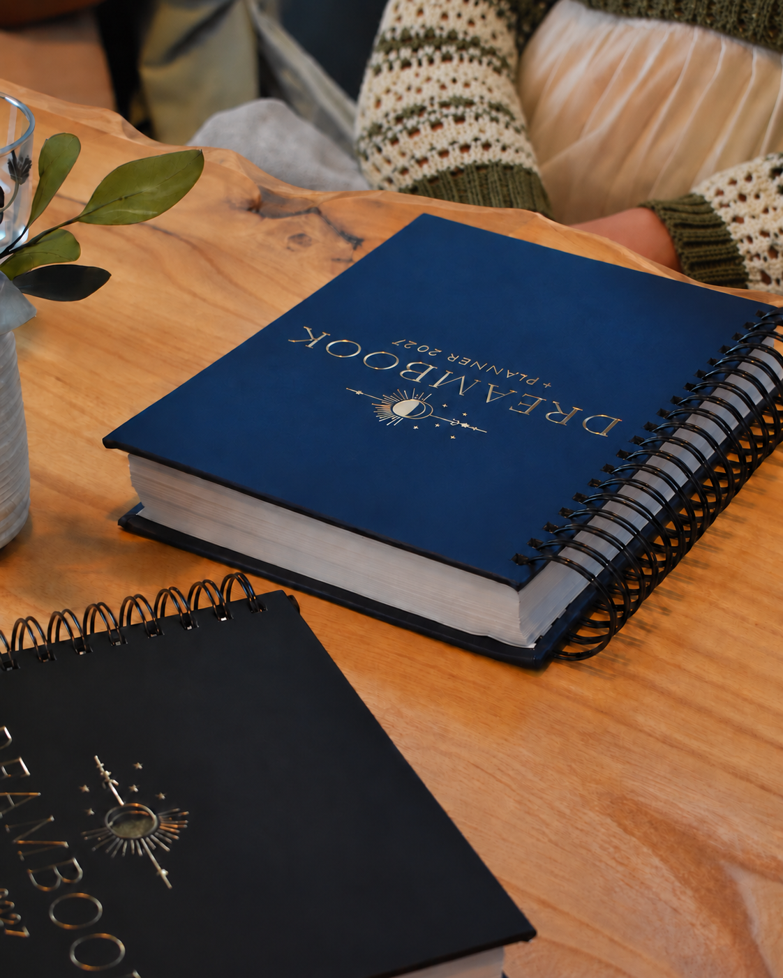 The Classic Black and Nightfall 2027 Dreambook + Planners on a table