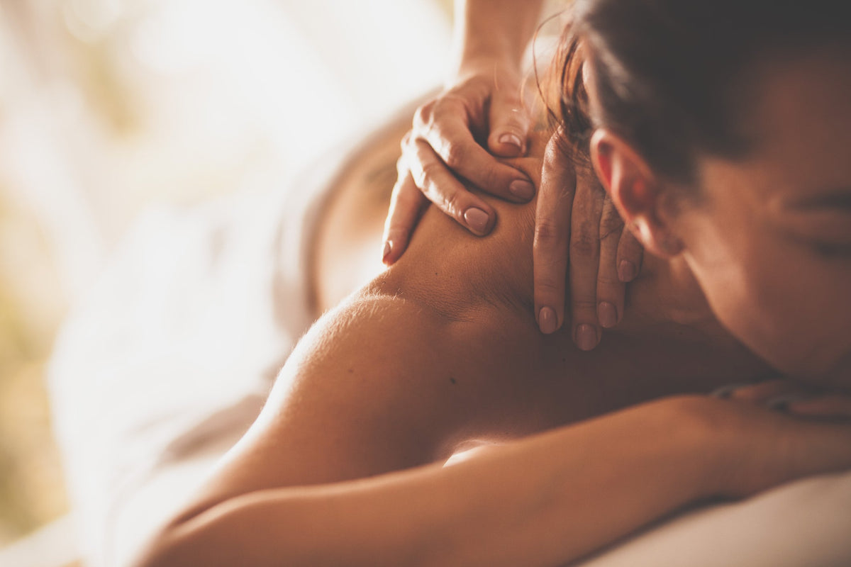 A guest relaxing during a Swedish massage