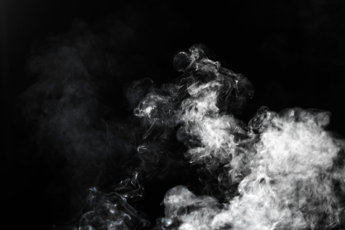 Soft steam rising against a dark background