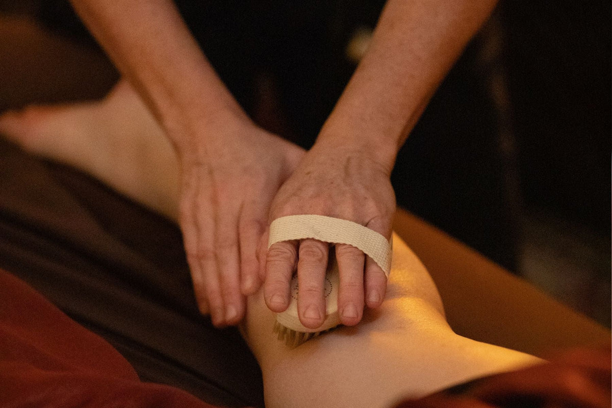 A plant fiber brush used for Ayurvedic skin brushing